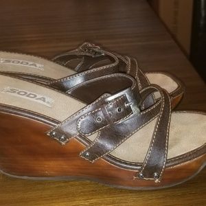 I am selling dark brown pair of wedges